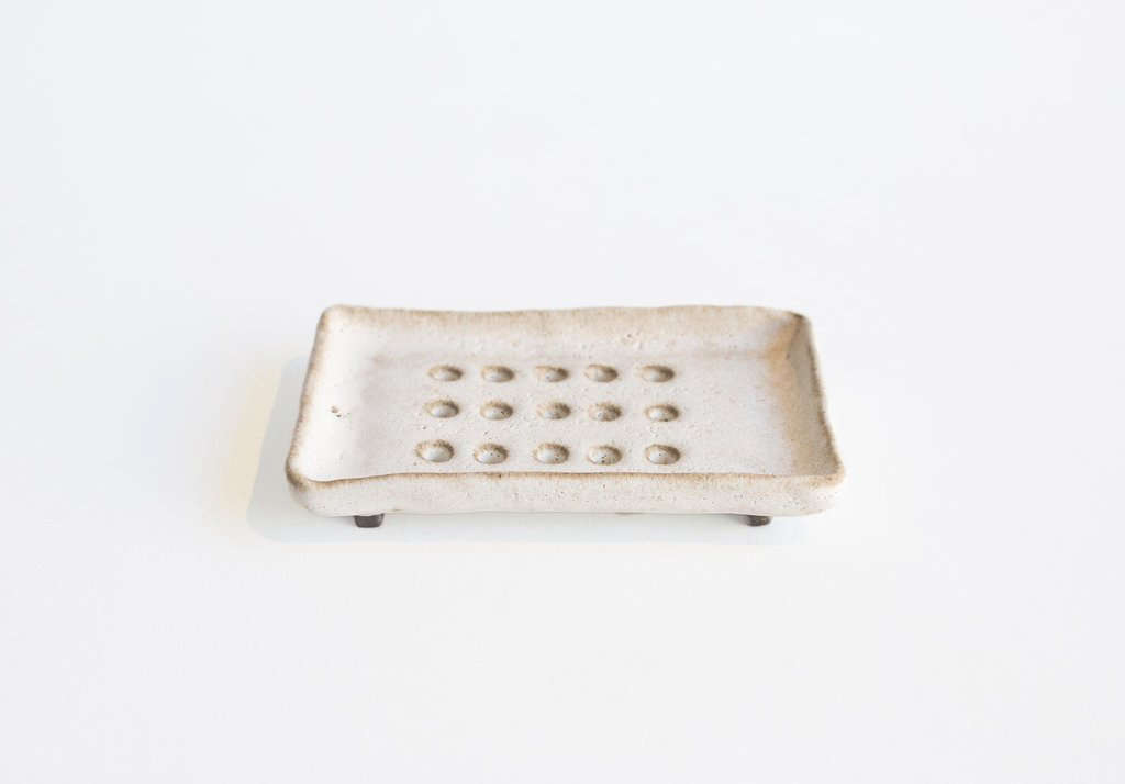 We started noticing (and admiring) rustic handmade soap dishes a few months ago. Shown above is the Object and Totem Soap Dish from Primary Essentials in Brooklyn. Other examples: the Flower Soap Dish from Alder & Co., the Soap Grill from Clam Lab, and our all-time favorite soap dish from a Lithuania ceramicist: Object of Desire: Haapa Ceramics Soap Dish.
