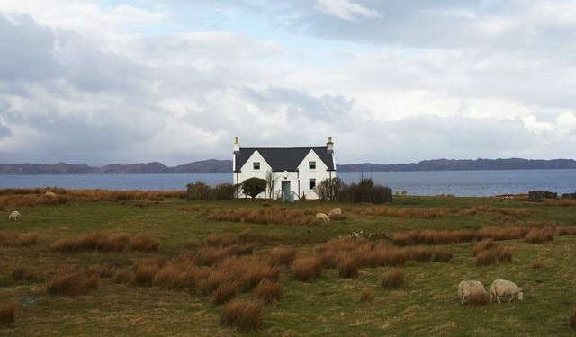 A Scottish croft looks out over the sea; see more in A Remote Scottish Bolt-Hole.