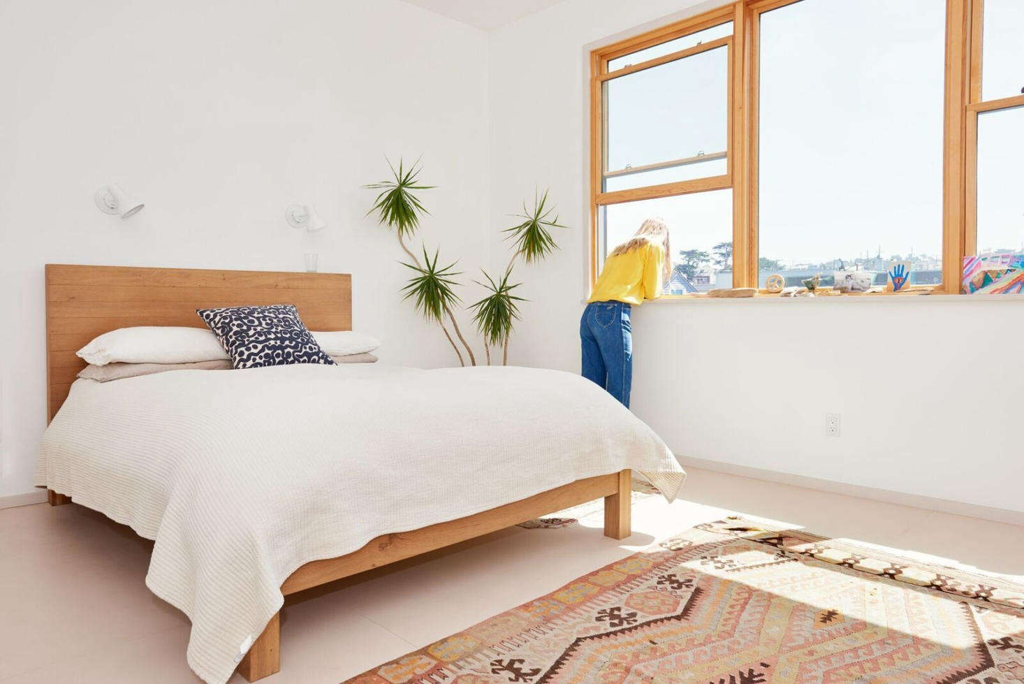 Their -plus-year-old Crate & Barrel bed moved with them from Brooklyn. 