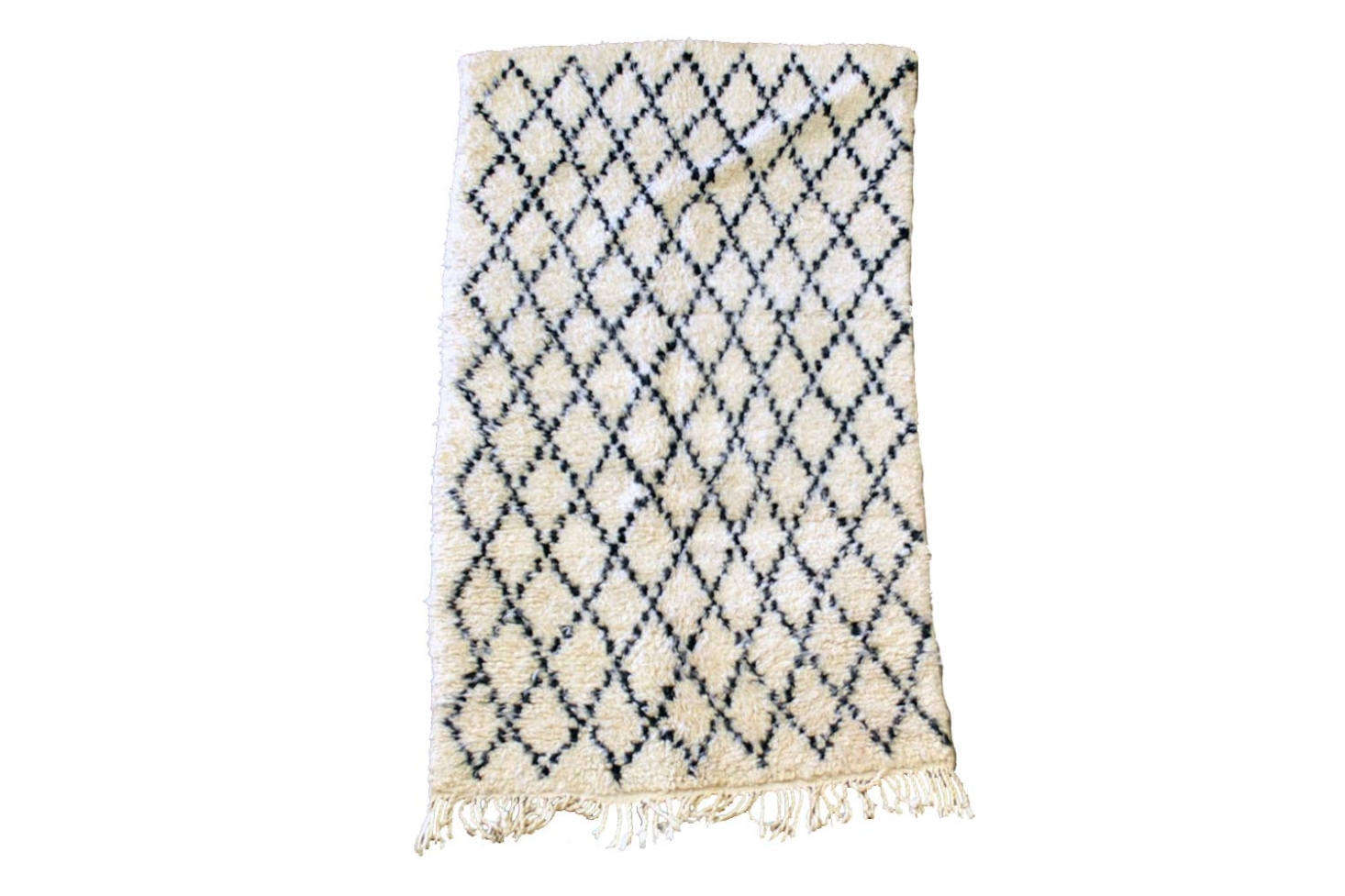 The Vintage Beni Ourain Rug handmade by Berber peoples in the Atlas Mountains of Morocco is £493 at SCP.