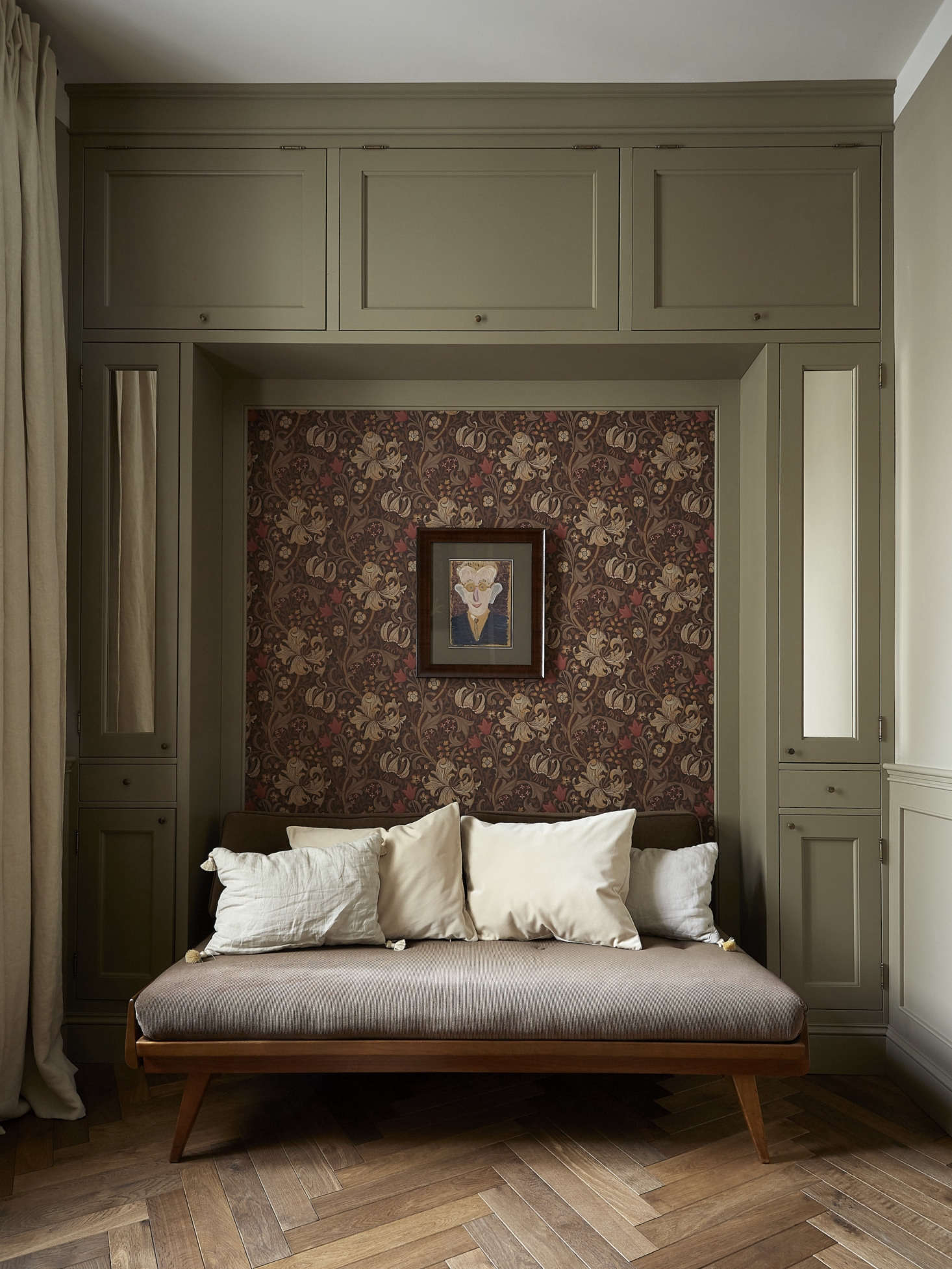 In the spare bedroom/study, a vintage Knoll daybed anchors the room.