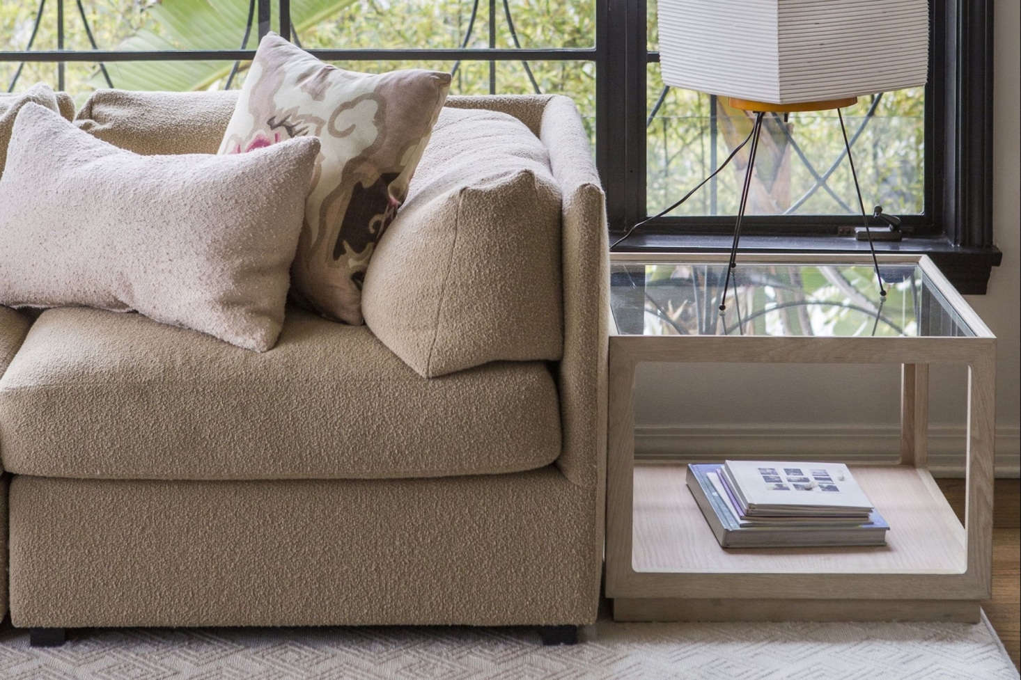 The Cube Table has a solid wood frame with a lower shelf and glass top (shown above in white oak); $1,650.