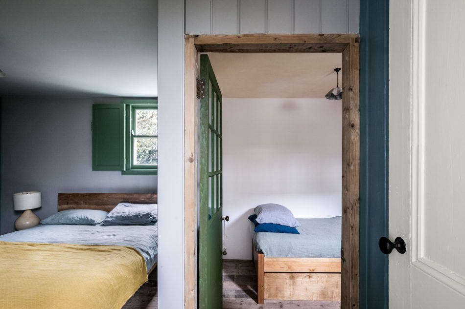 Another small bedroom is adjacent to the master bedroom.