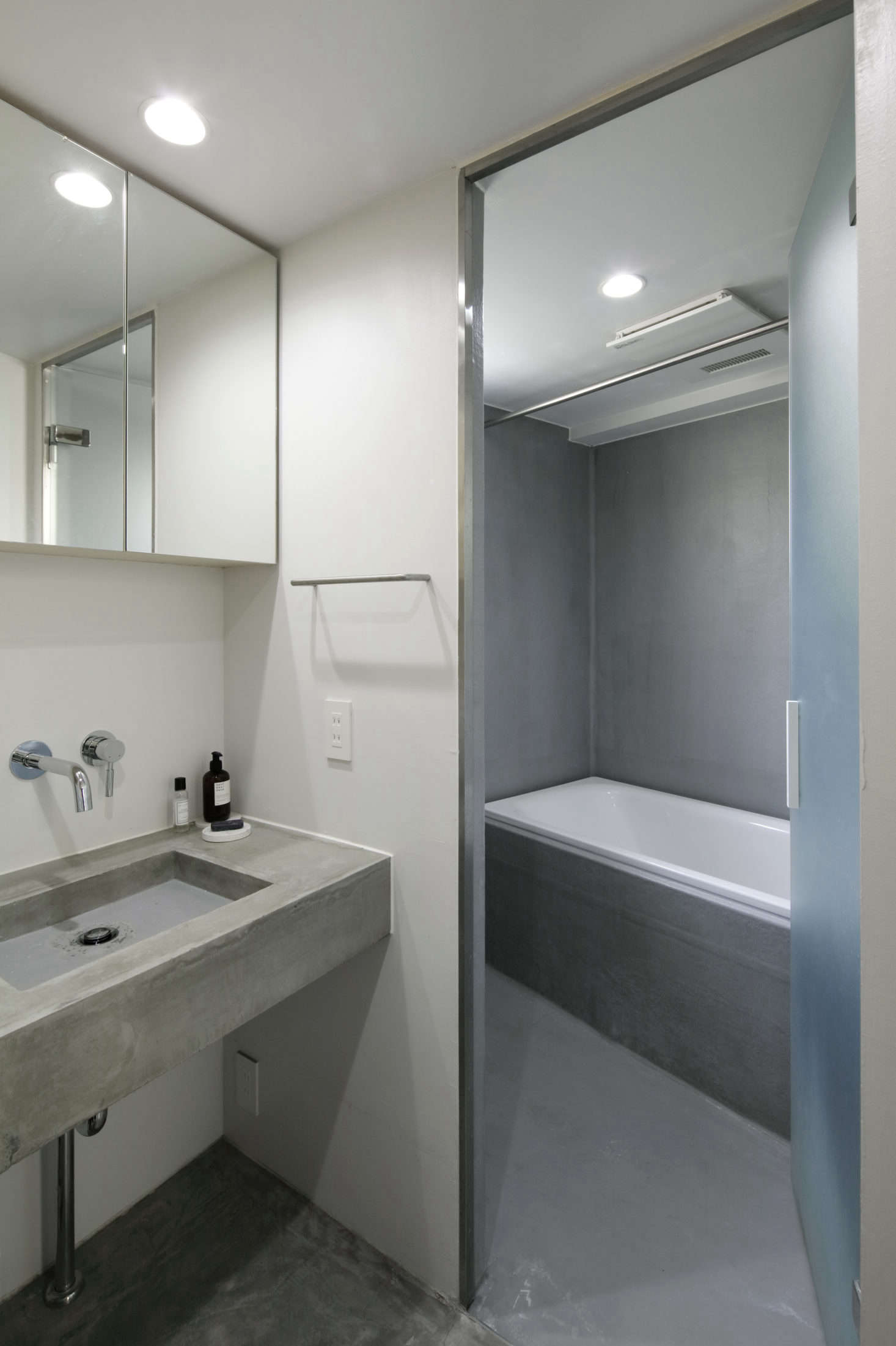 The master bath is a study in concrete.