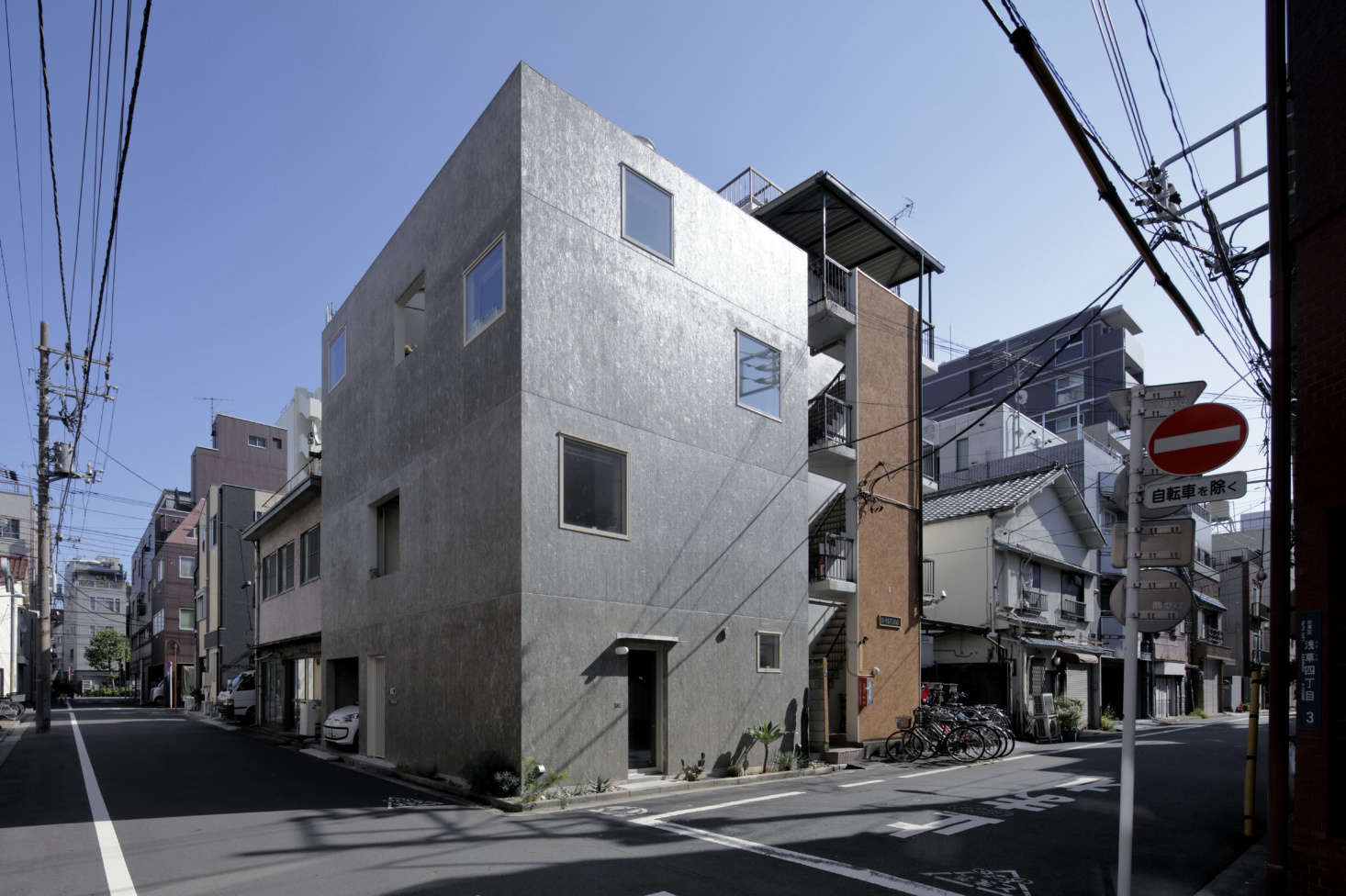 The neighborhood is a tightly packed patchwork of new and old.
