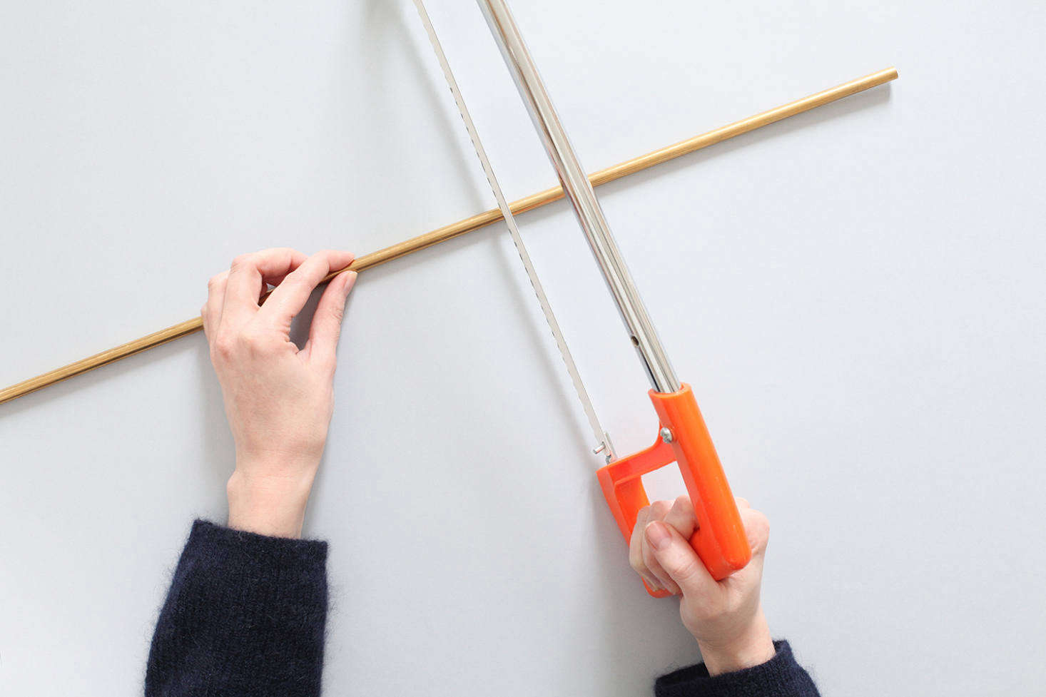 If your supplier won’t cut a brass rod to size—53 centimeters long—use a hacksaw and sand the edges.