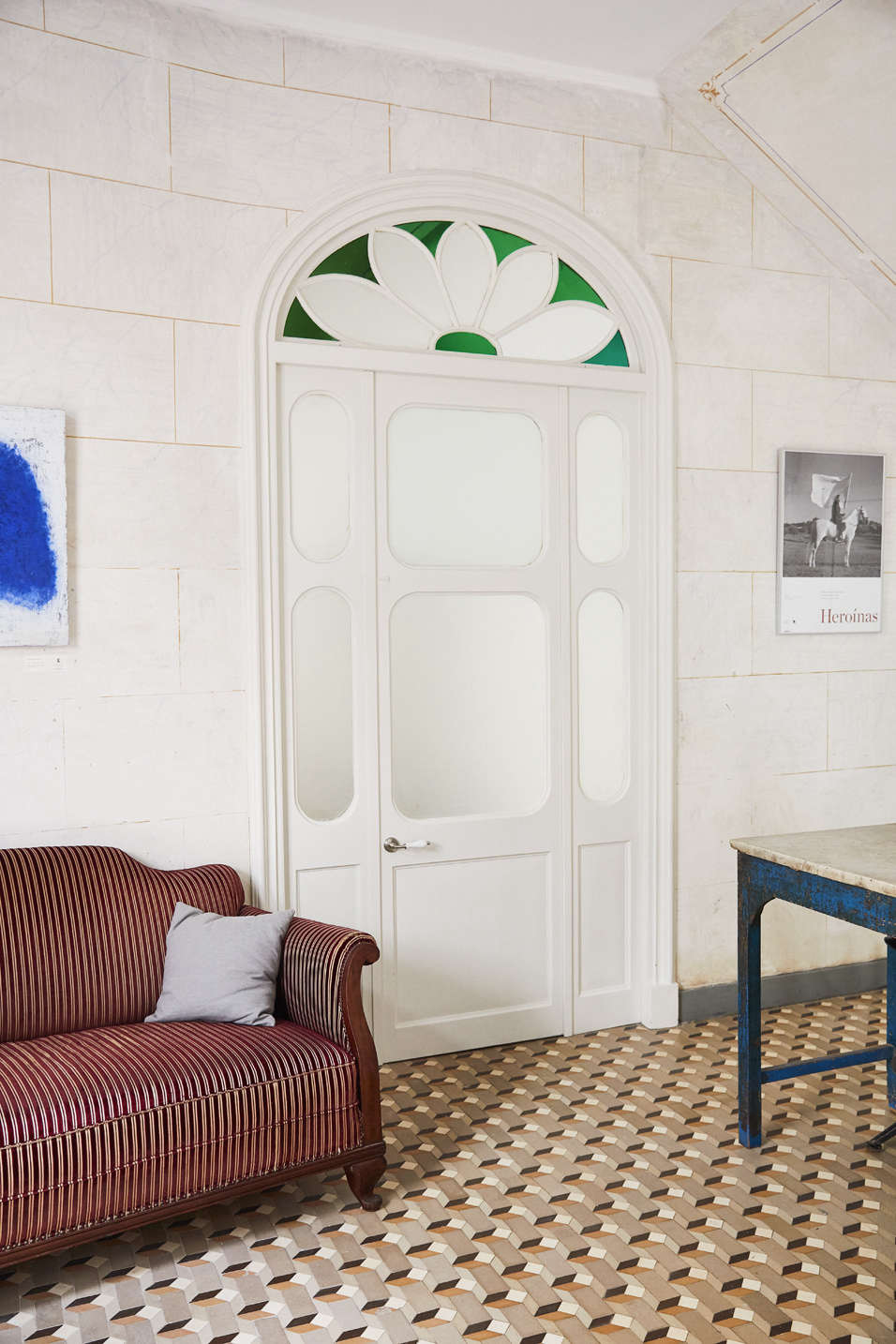 The colorful geometric mosaic cement floor tiles are original to the building, from the end of the th century. The style, Ignasi explains, is typical to the historic homes of the region, once owned by the bourgeoisie, merchants, and clergy of Maó.