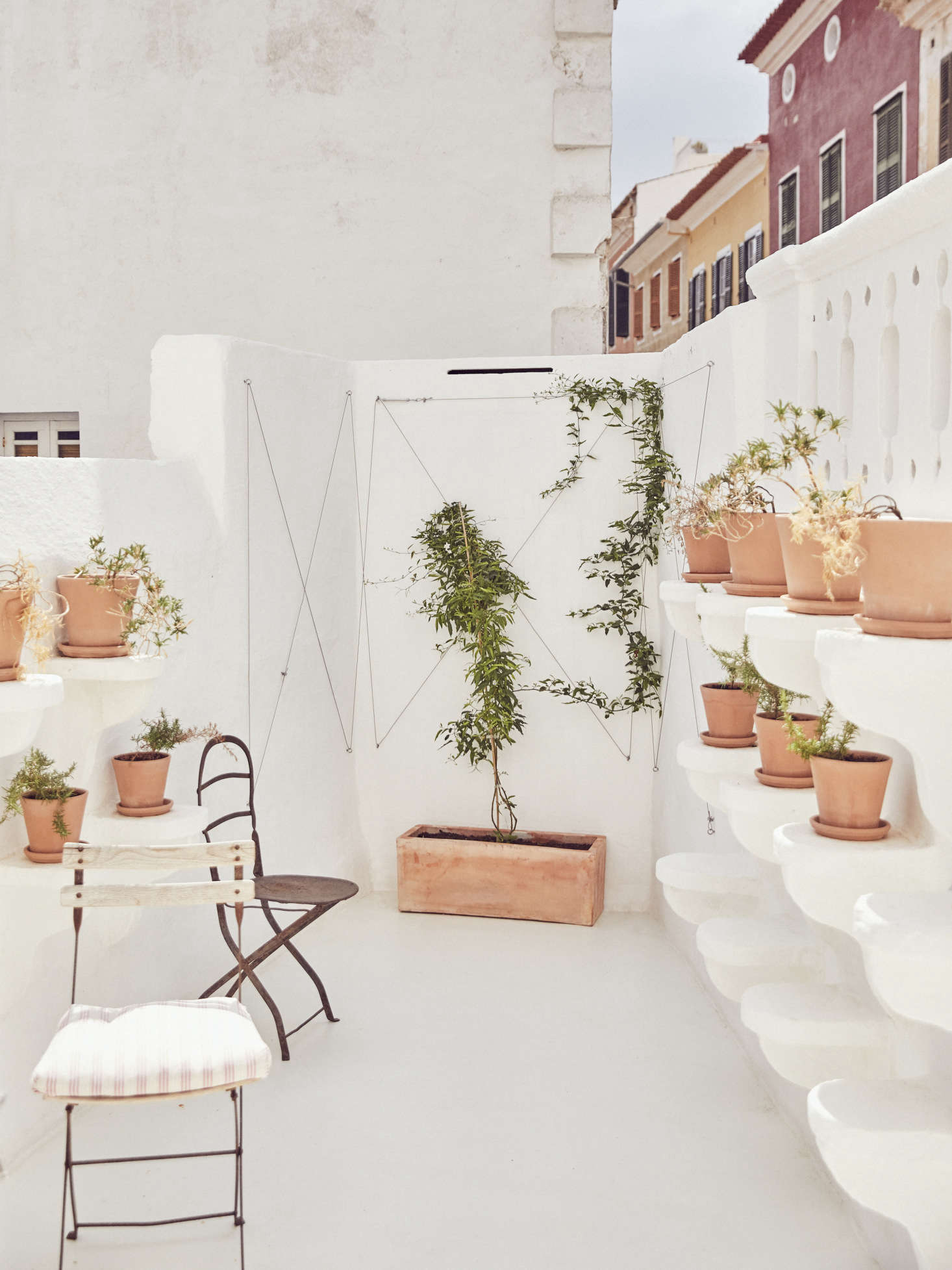 On the left, built-in platforms for potted plants are original to the building from the late th century.