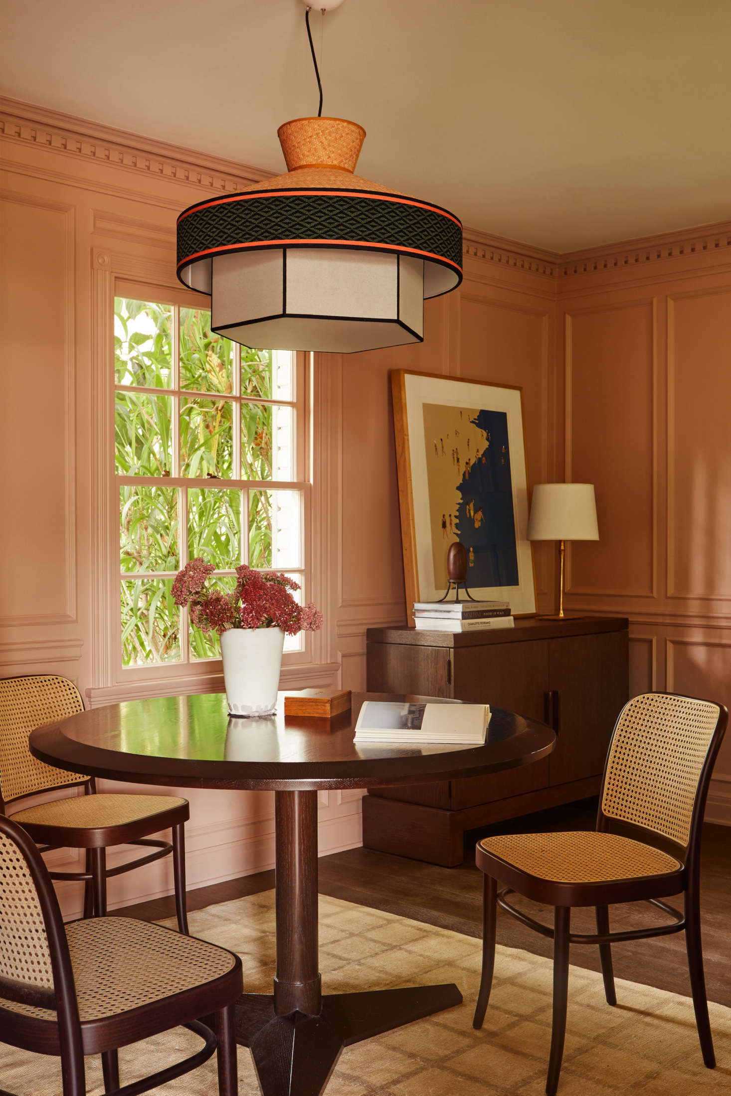 The family gather in the paneled game room to play Rummikube and canasta—