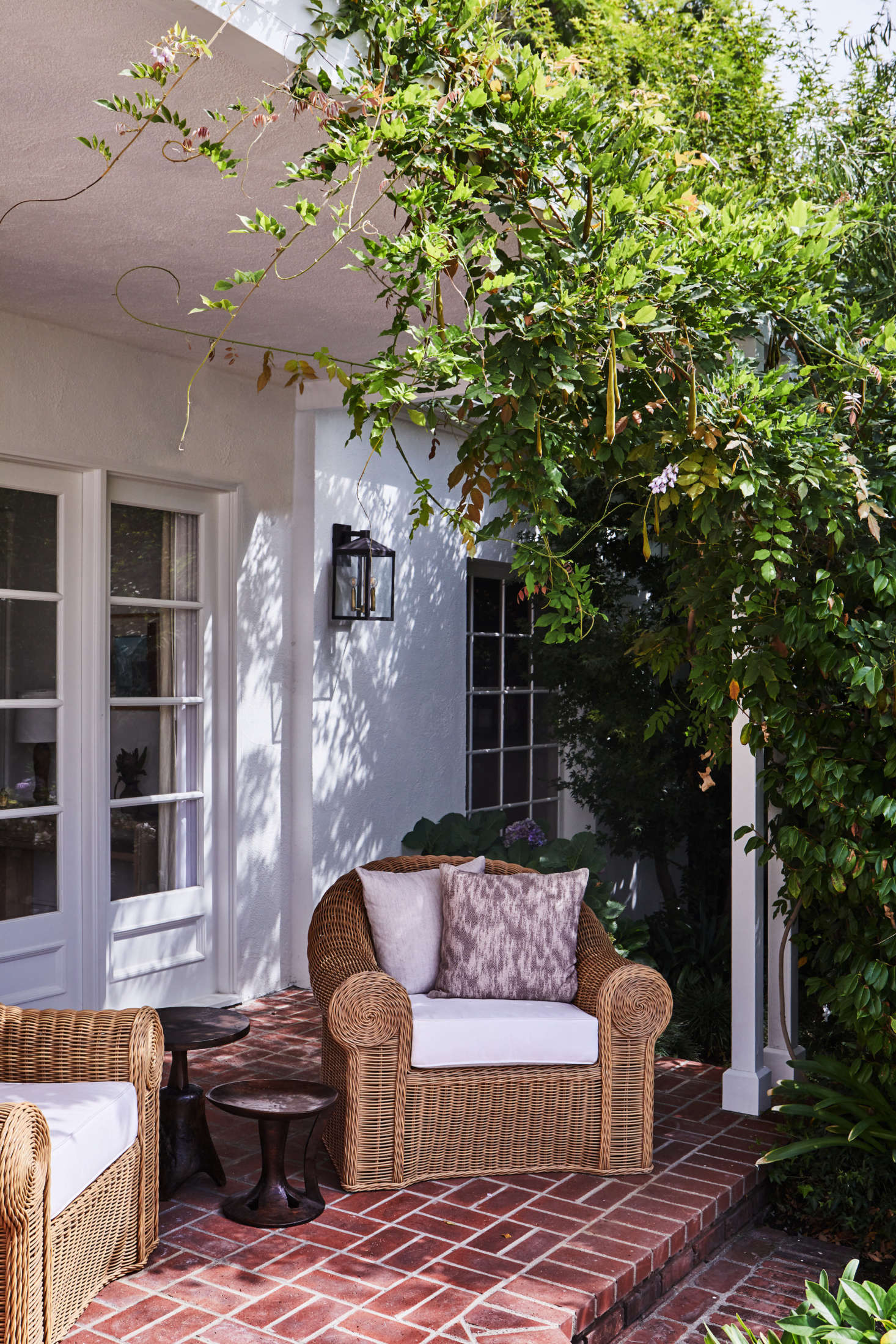 A shaded sitting area off the living room opens to a terrace.