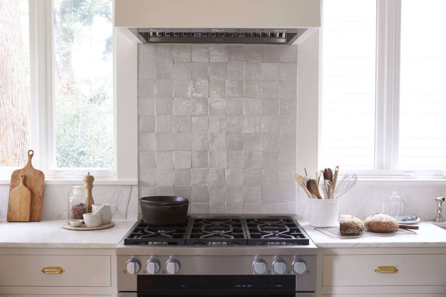 All of the new appliances are by Miele. The backsplash is composed of Clé tiles.