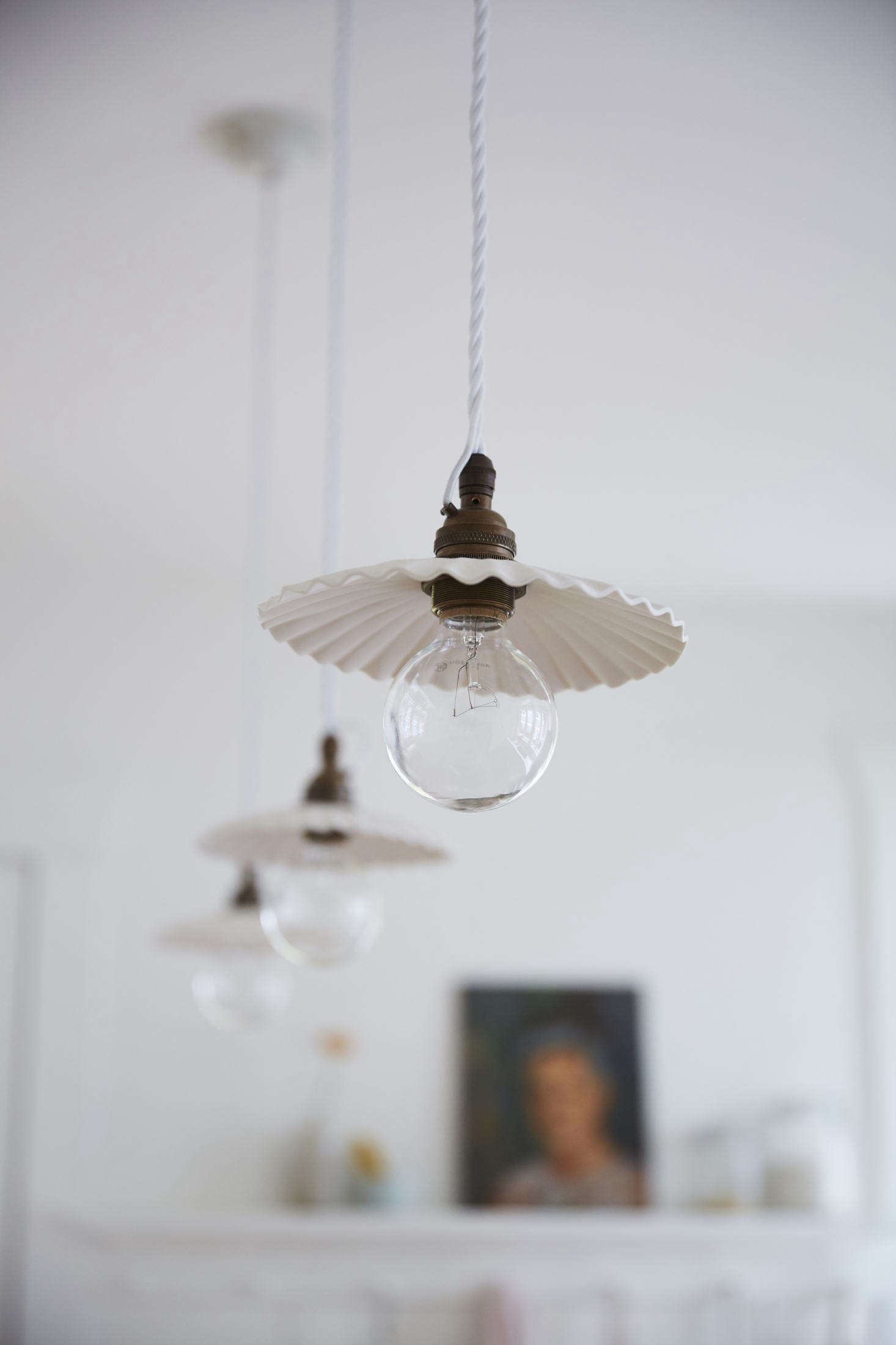 A trio of porcelain pendant lights by deVol hang over the island. (See New from deVol: A NYC Showroom and Porcelain Pendant Lights, Handmade in England.)