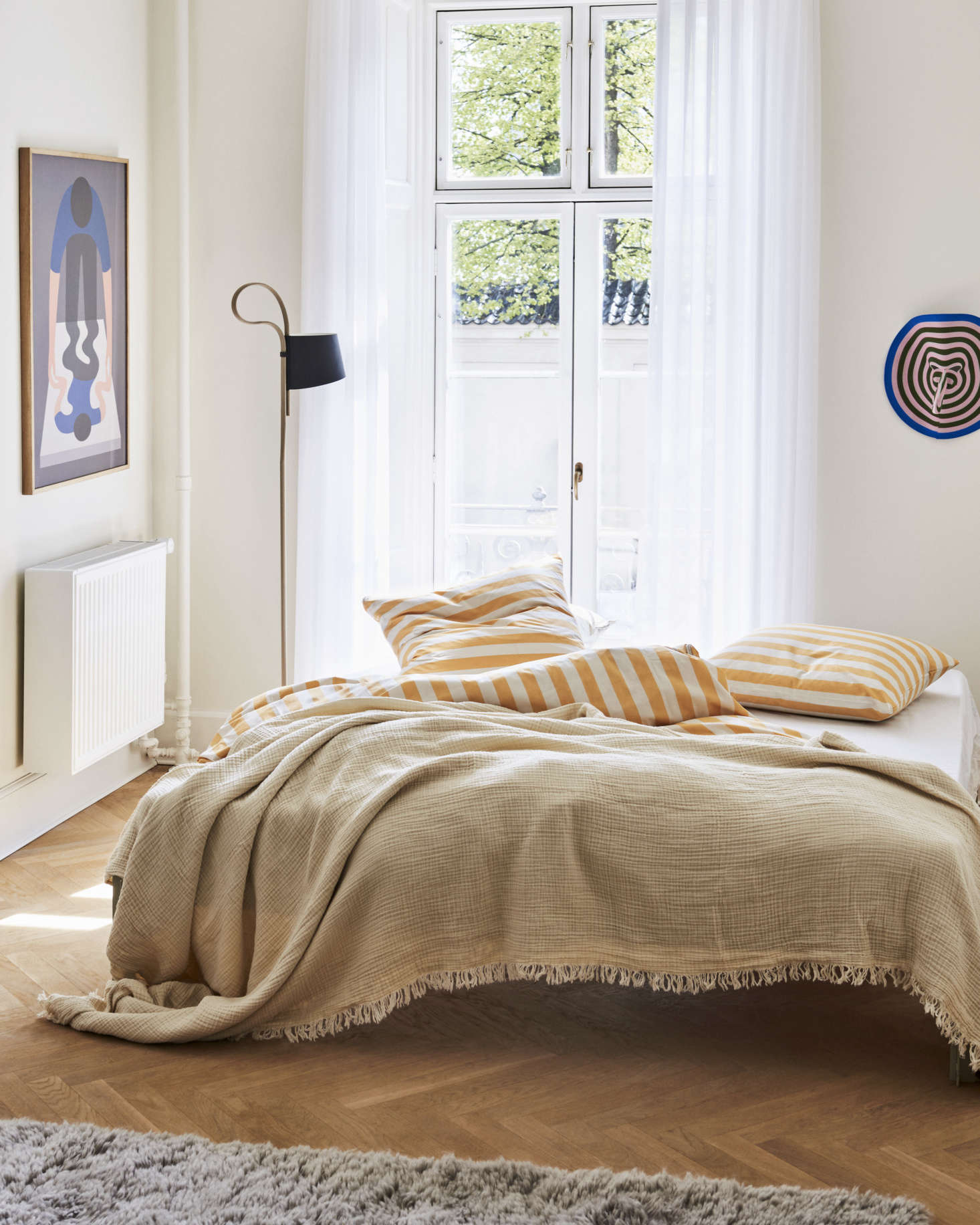 The Ete Collection in warm yellow; the bed cover is the Crinkled Bedspread in cream.