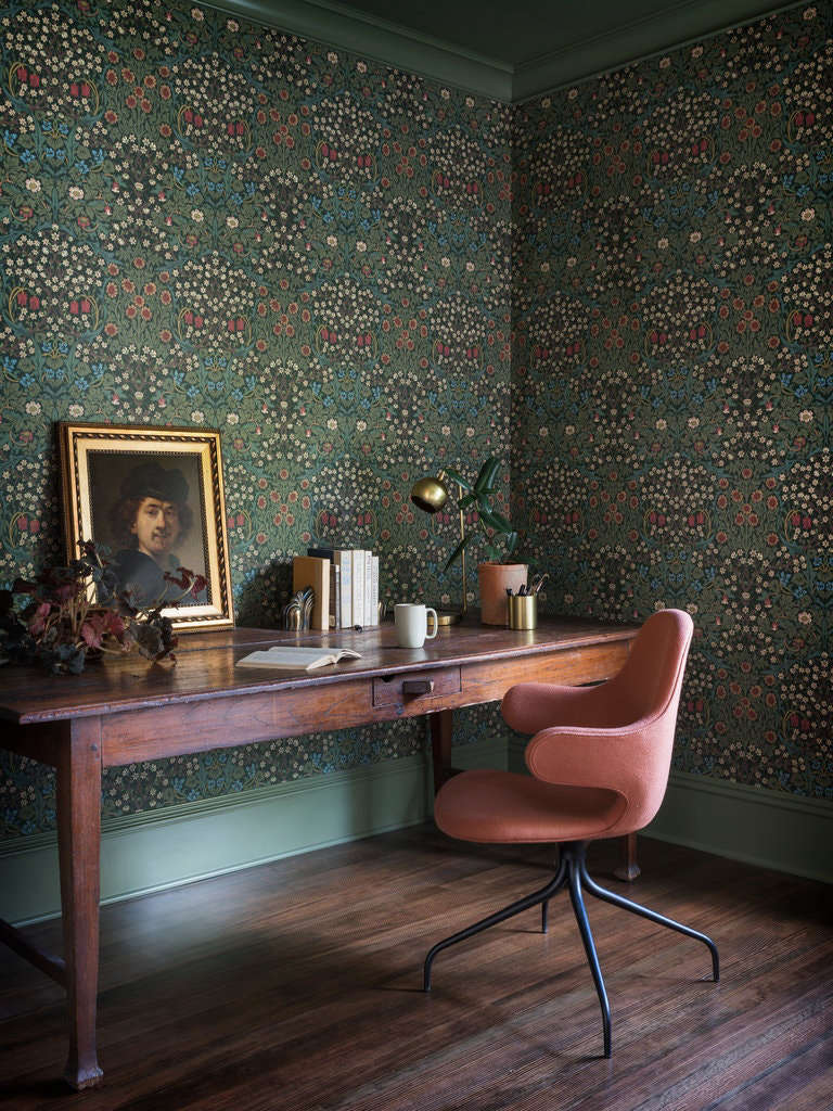 “Almost all of the furniture and decorative lighting is new. The gorgeous old desk in the study is a piece that the clients owned before the renovation, and I love it,” says Eng-Goetz. The botanical wallpaper is by Morris & Co.