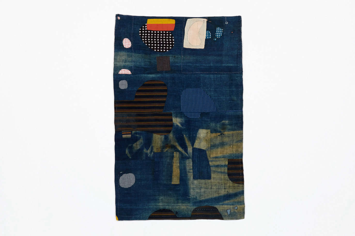 The APM01 Indigo Mat is $2,500 at Commune.