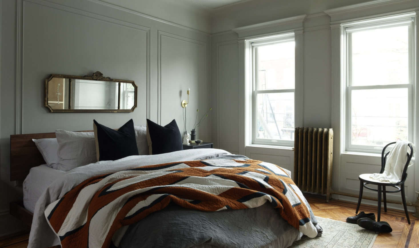 The second floor houses a master suite, Kocher’s solution to make the previously awkward, chopped-up space feel more cohesive.