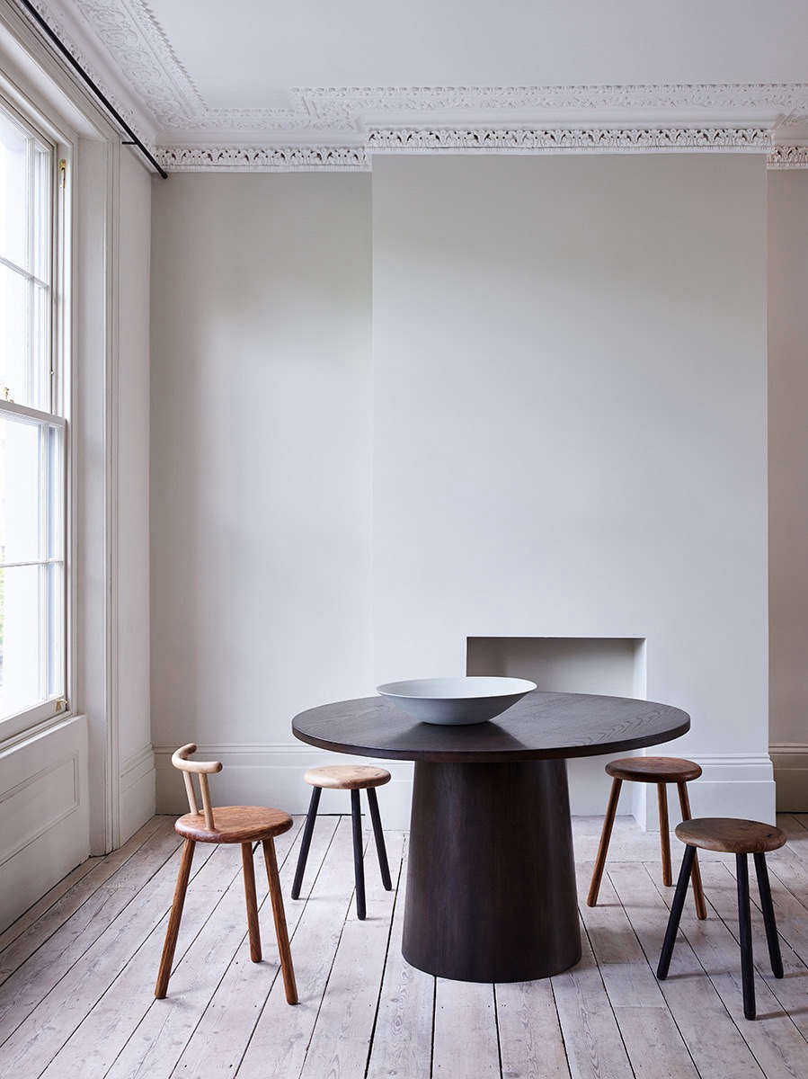 The Note Table surrounded by a trio of Pippy Stools (£500 each) and a Low Back Chair (£850).