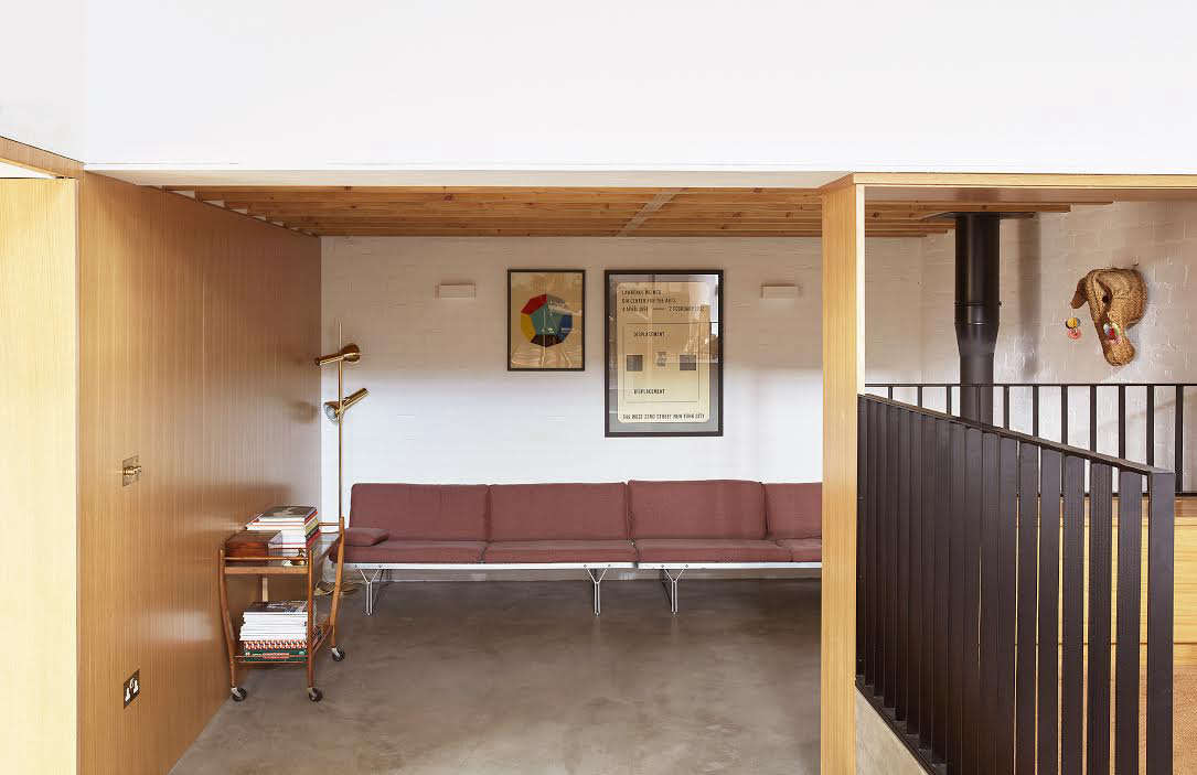 “We had to dig down to create enough head height for the snug and mezzanine bedroom,” says Sandy. She recently introduced a pair of classic Ikea sofas to the space. (Scroll up to see how she originally furnished the snug.) Photograph by Sandy Suffield.