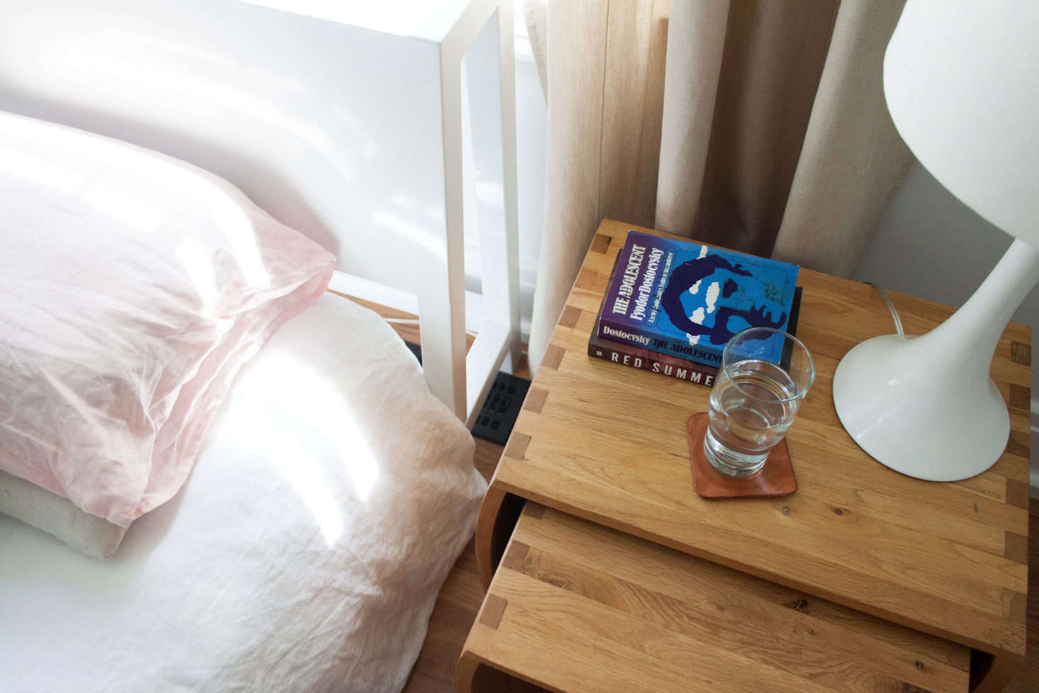Both the bed and the lamp are from CB2.