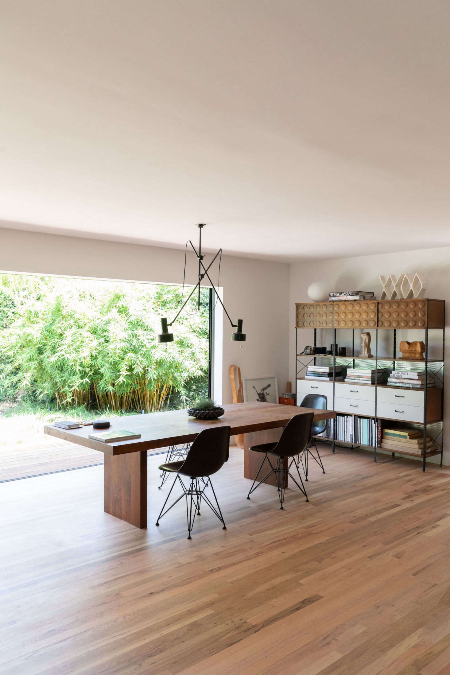 Dining with a view. Yanai designed the table; the hanging light is by Remodelista favorite Olivier Abry of Wo and We in France.