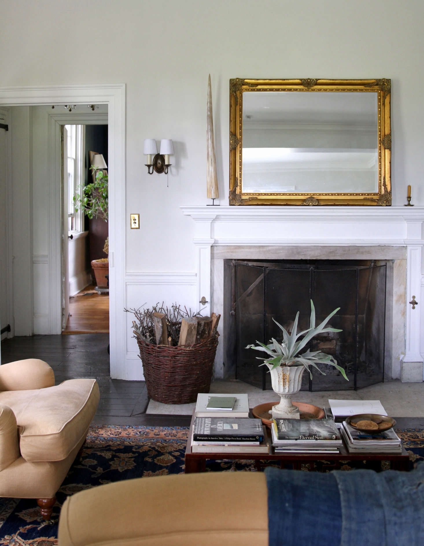 Two parlors on the first floor provide ample space to relax and unwind. Pictured is the back parlor.