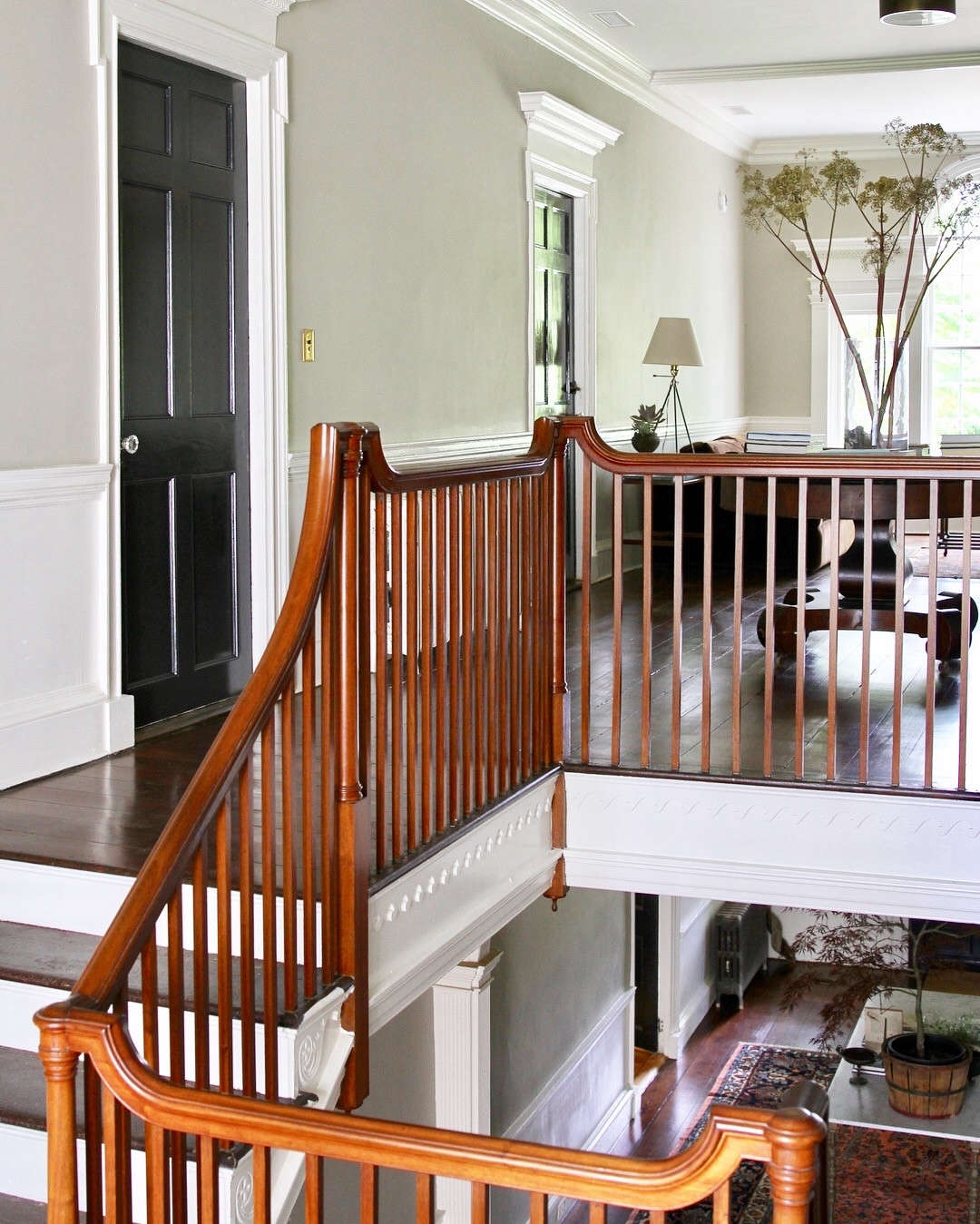 The gorgeous original staircase leads to guest rooms and a second-floor sitting area. The floors are yellow pine, installed in the mid 1800s.