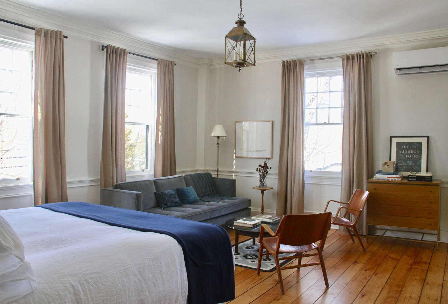 There are five guest rooms in all. Each room has Matteo bed linens, Faribault blankets, and charm to spare. This is guest room #2, with walls painted Light Pewter.