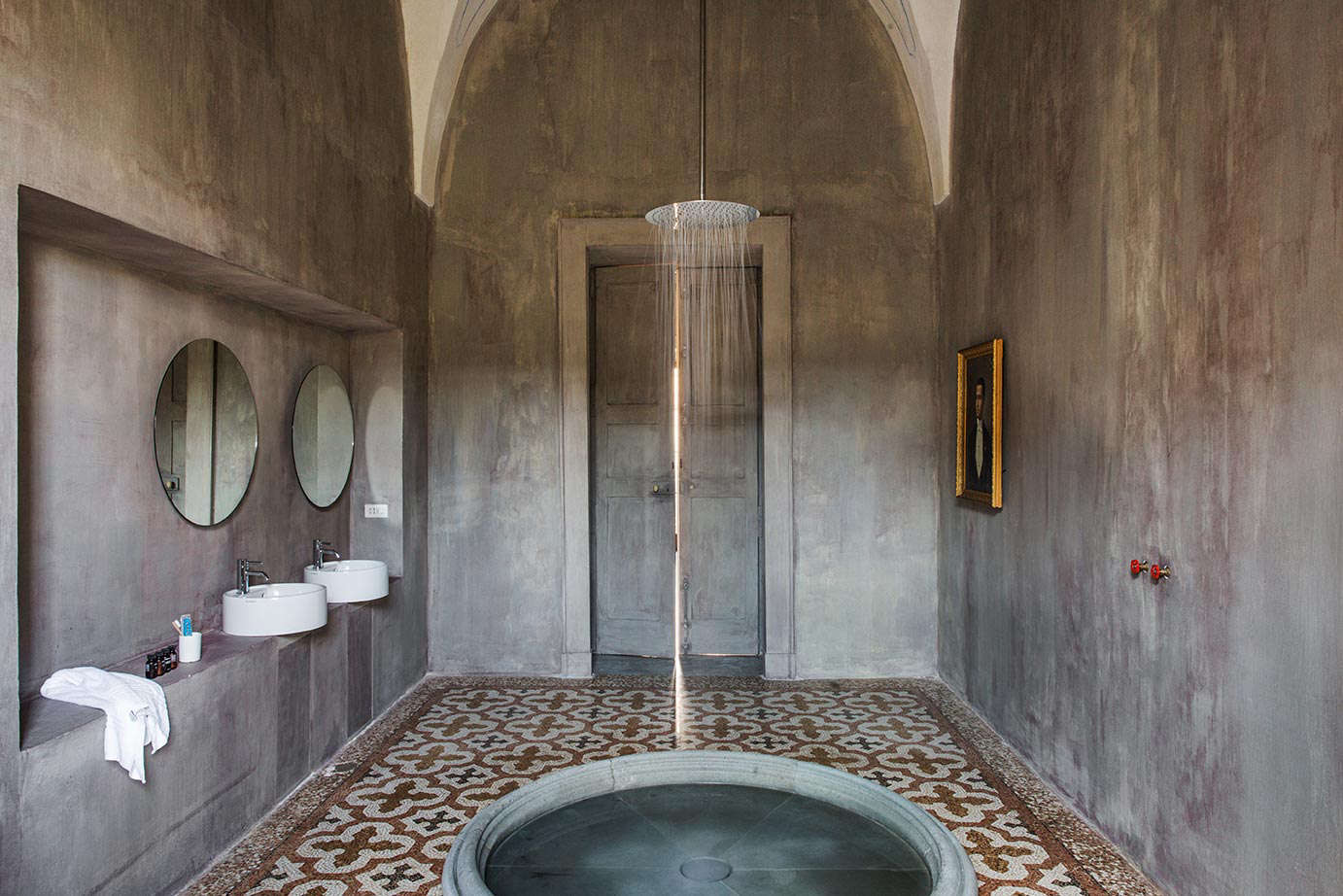 The bathroom in a Royal Junior Suite has the feel of an ancient bath.