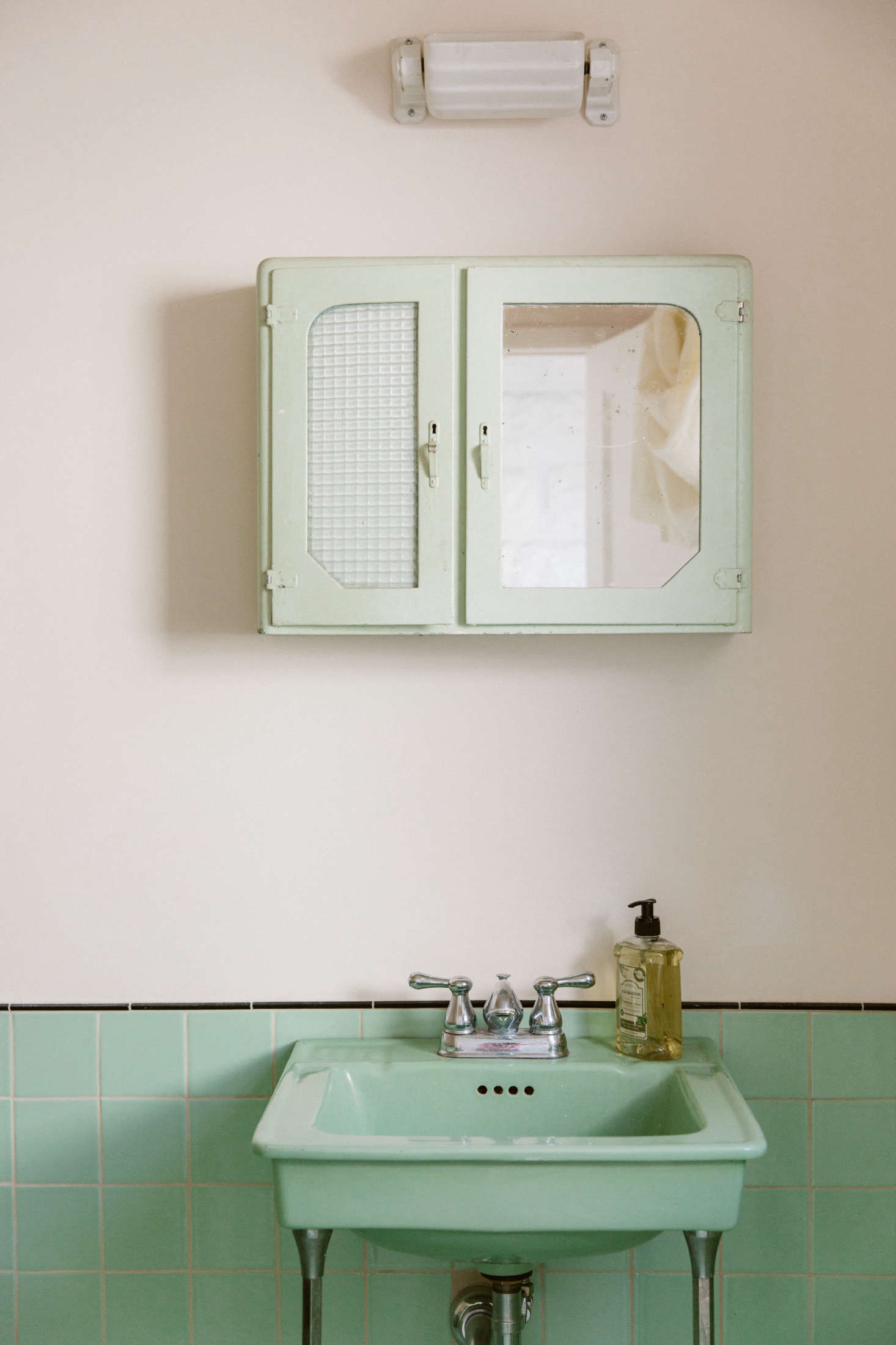 The shop’s bathroom only looks like it’s been there forever. “There was an existing bathroom, but it had seen better days,” O’Rourke says. “We replaced all the fixtures with the antique minty-colored ones, also sourced locally in LA; then we found new tiles to match.”