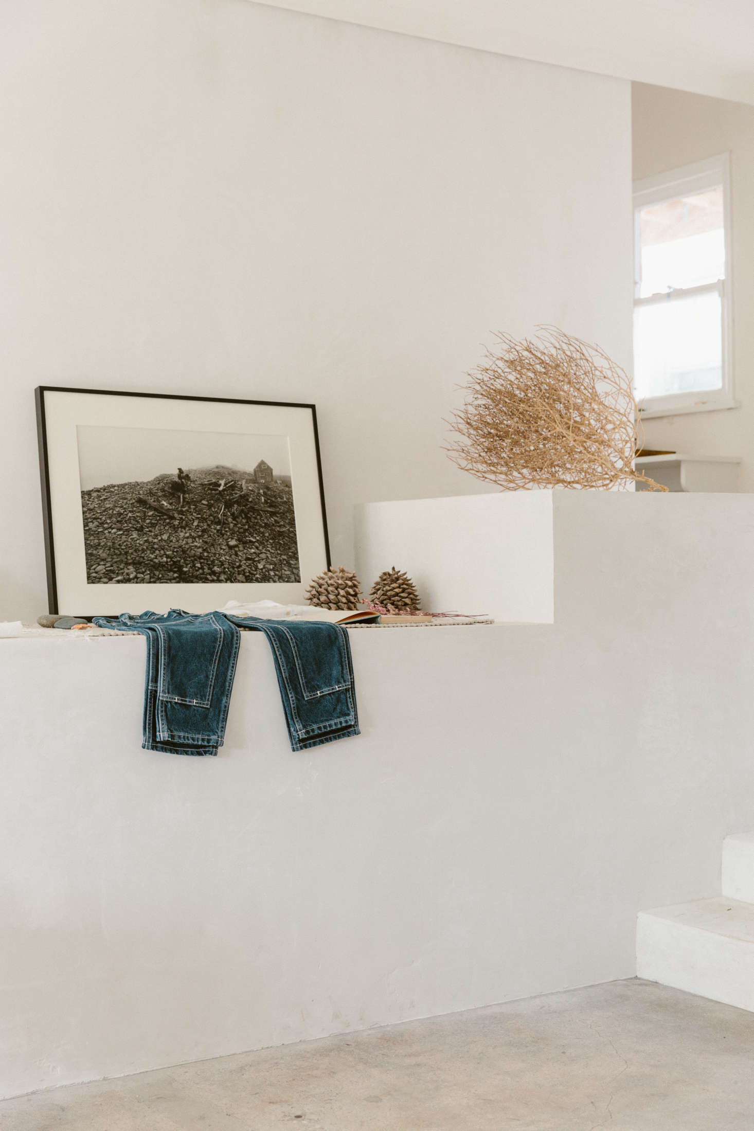 The pedestals were built specifically for the dusty brown tumbleweed that sits atop them: “We drove from Maine to California with both of our boys and a truckload of antiques and tools,” O’Rourke says. “Somewhere between Marfa, Texas, and Phoenix, Arizona, I made Anthony pull over and get this tumbleweed for the store. We ended up building the pedestal for it, which is kind of ridiculous, but it just sits so perfectly right there.”