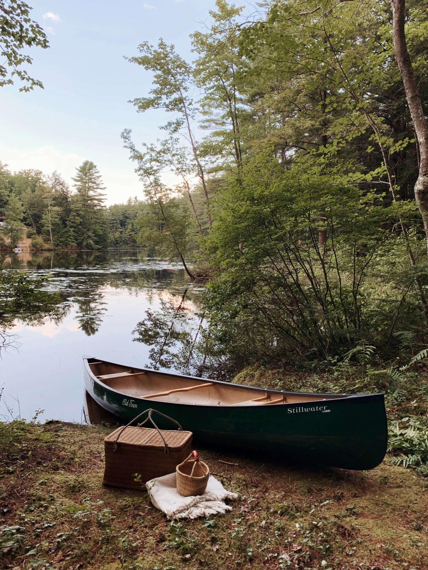 A canoe is always ready by the pond for a picnic—or a paddle out to get service.