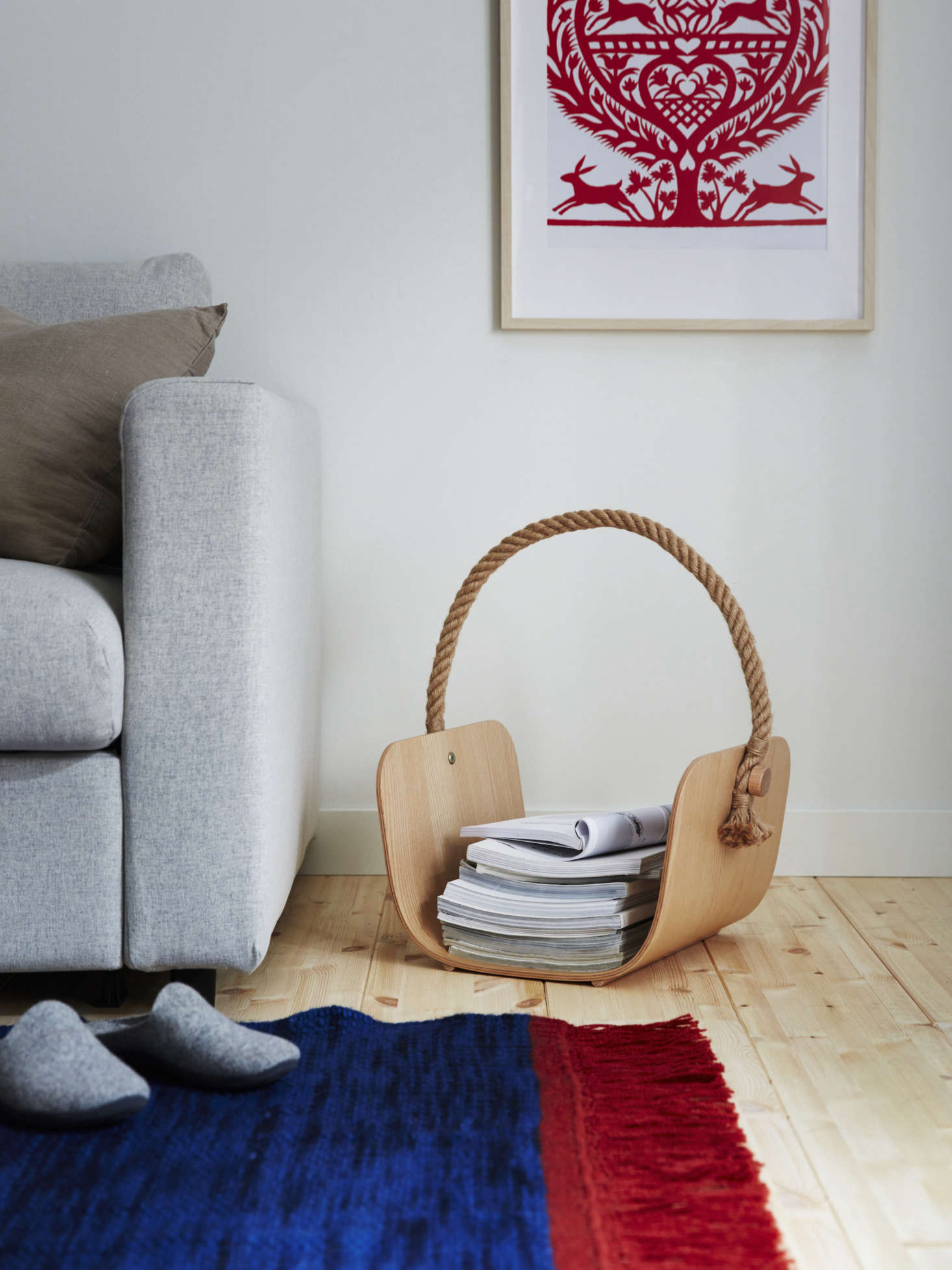 The ash veneer basket, designed by Sarah Fager and Jens Fager of Sweden, boasts a hemp handle; $39.99. The flat-woven rug is 0 percent wool; $data-src=