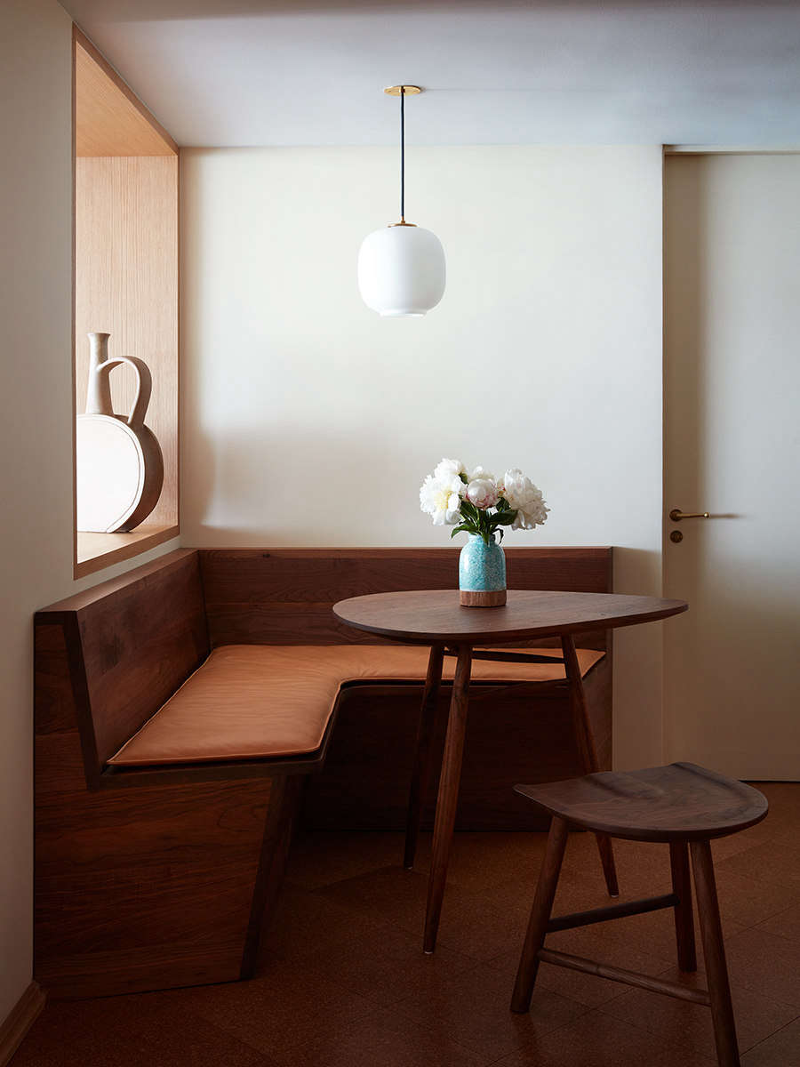 A VL45 Radiohus Pendant hangs in the custom breakfast nook.
