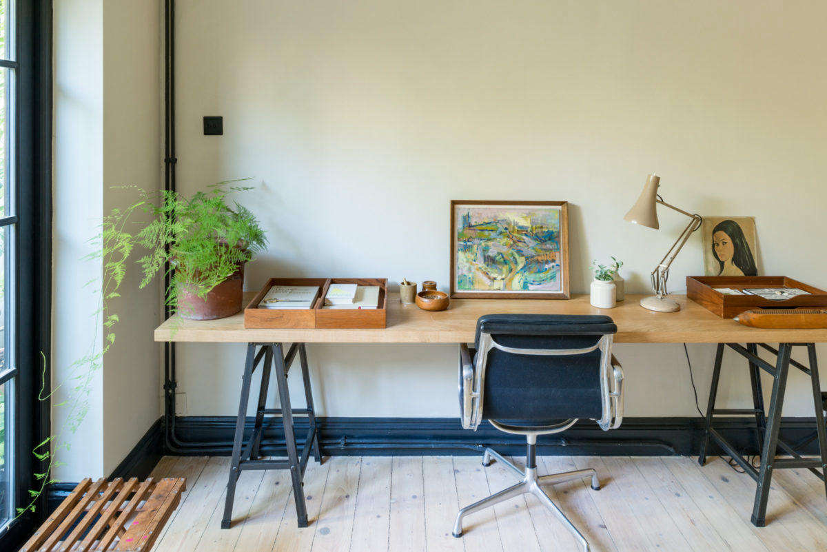 Paul commissioned the oak desk to fit the space.