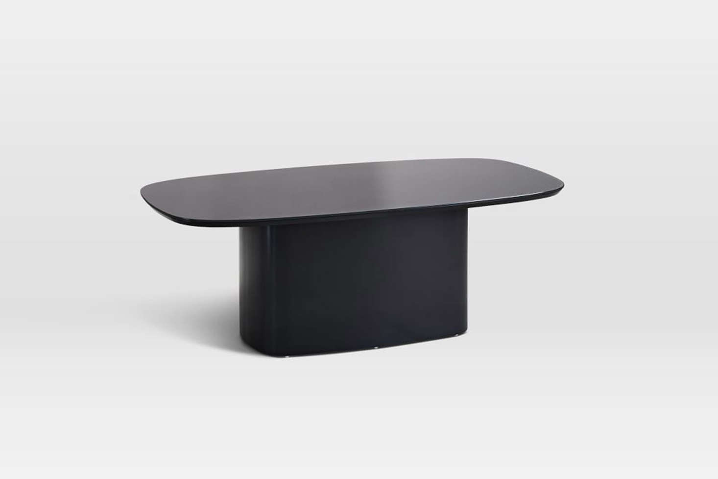 The Superellipse Glass Top Coffee Table in Anthracite is $9.99 at West Elm.