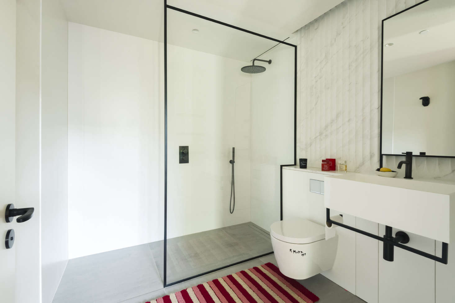 The commode is decorated with a Marcel Duchamp–inspired Fountain Decal, available from the Philadelphia Museum of Art.