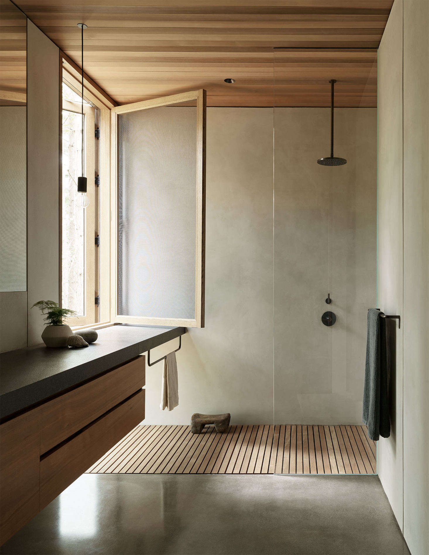 Zen perfection in the bathroom, which features a shower with a view. &#8