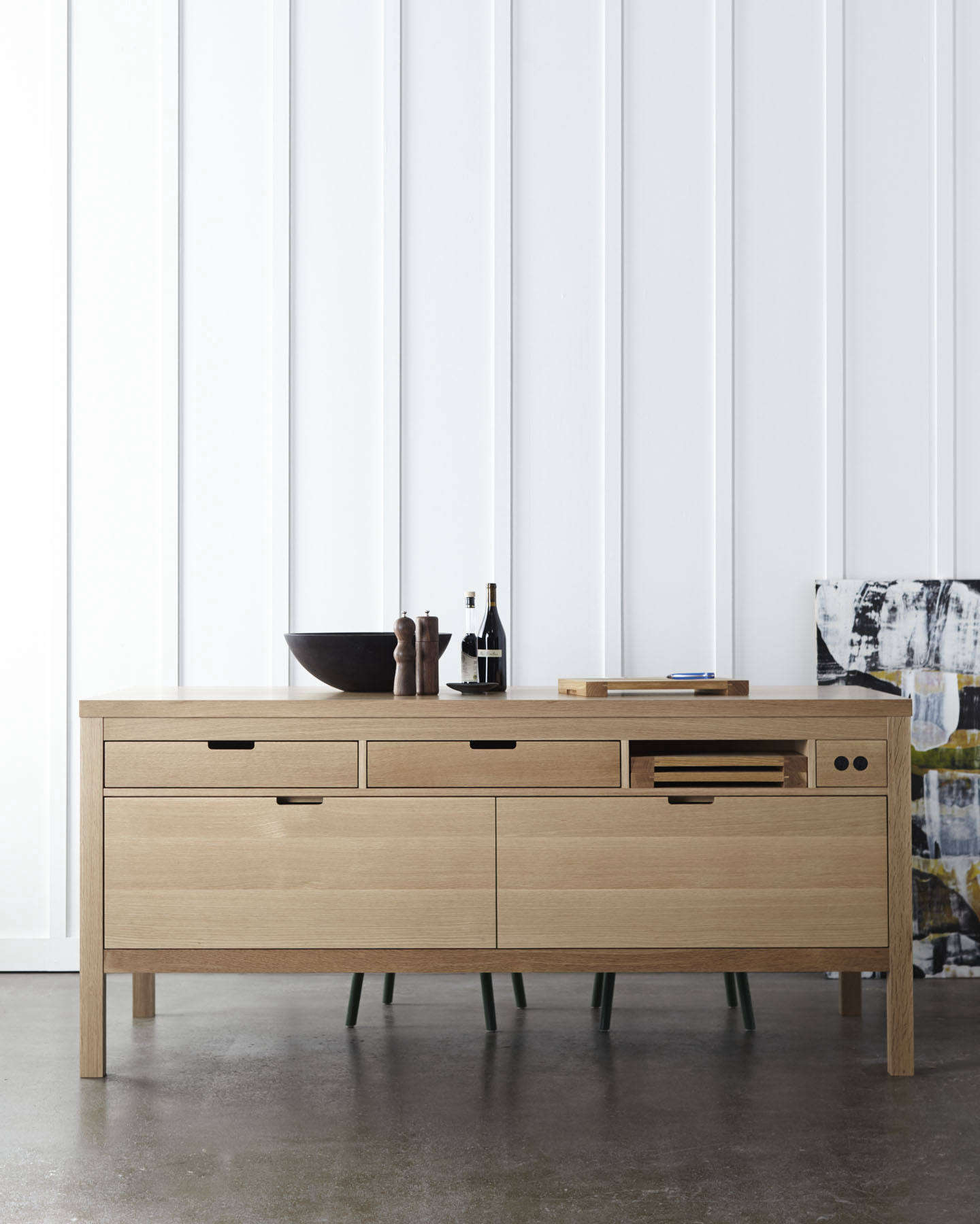 The Bake Off island functions as a staging area for cooking and also includes a bar-like ledge that can accommodate stools.