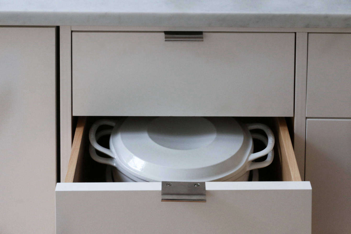 A happy accident: The Vermicular (plus all its attendant parts) fits neatly into a deep drawer in my kitchen. The unit comes in a choice of Sea Salt, Matte Black, or Charcoal.