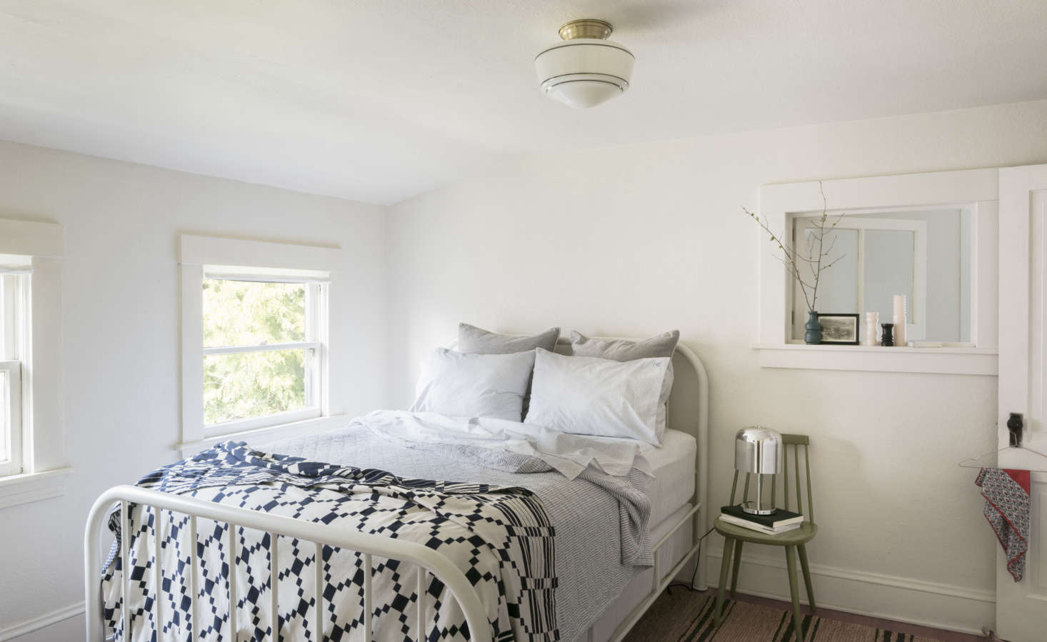 A bedroom—never again a master bedroom. Photograph from Urban Cottage: Designer and “Creativepreneur” Angela Medlin’s Chic Victorian in Portland, OR.