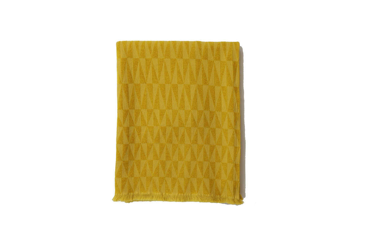 We like the sunniness of the Apex Throw in goldenrod ($5, currently on sale for $5), though it
