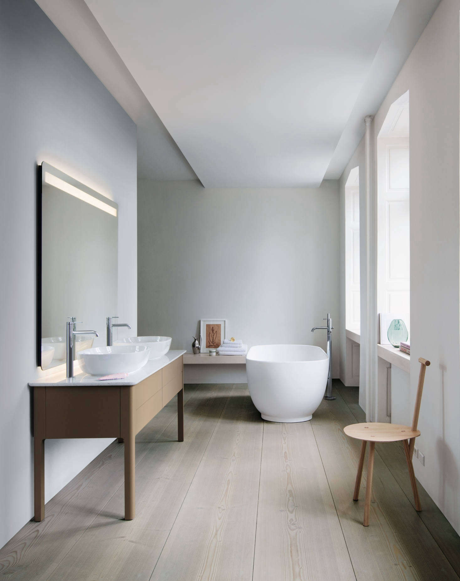The matte-lacquered consoles come in a range of sizes and finishes with counters of quartz or American walnut. They