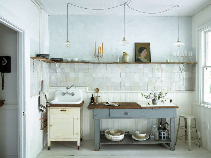 Vintage inspired rustic boho kitchen with white terracotta tiles and plaster by Zio & Sons in Hudson, NY